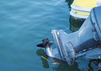 Naklejka premium Detail of outboard engine. outboard engine on my boat