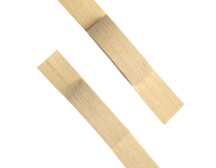 Two wooden rectangular pieces with lighter center panels. Angled on black