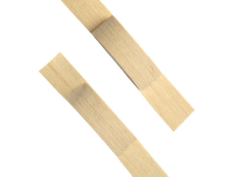 Two wooden rectangular pieces with lighter center panels. Angled on black