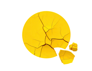 Cracked, yellow circular shape, isolated against a black background