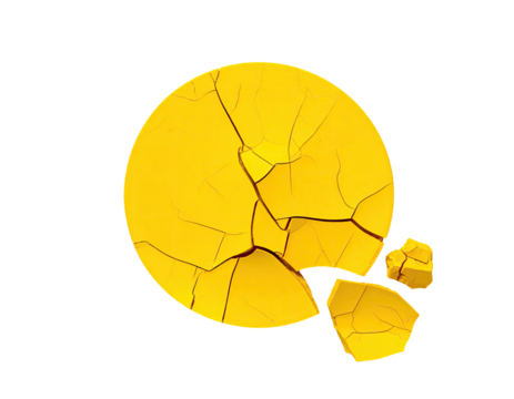 Cracked, yellow circular shape, isolated against a black background