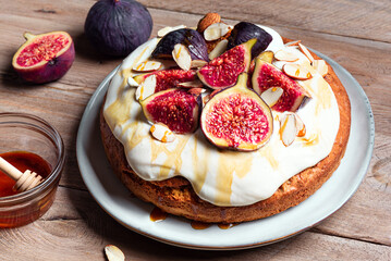 Almond cake with figs, cream cheese and honey