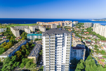 Obraz premium Gelendzhik resort. Multi-storey residential building overlooking Gelendzhik Bay, Black Sea.