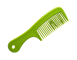 A bright green plastic comb with a handle against a stark black background
