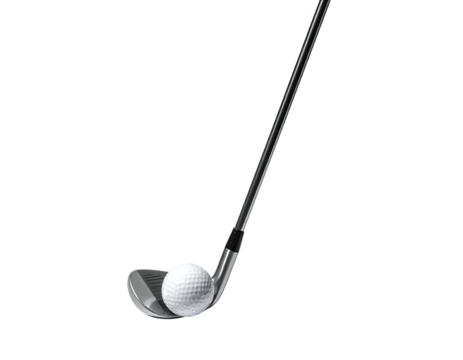 Golf club poised over a ball against a black background, in mid-swing
