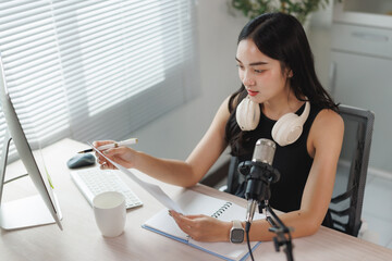 Young woman creating content for online podcast