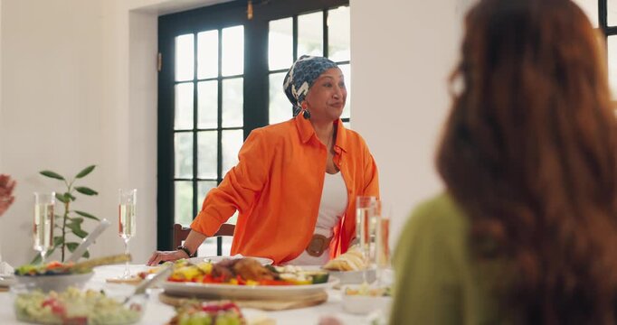 Friends, women and serving food in home for social gathering, reunion lunch and bonding. Happy people, group and host with roast dinner at dining table for party celebration, weekend brunch and event