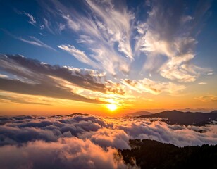 Sunrise or sunset over a sea of clouds and mountains
