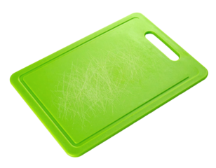 A rectangular, slightly angled, bright green cutting board with a dark background