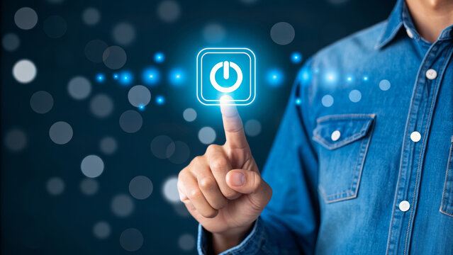 Budget shutdown government furlough economy usa modern finger pressing power button glowing technology startup digital business concept with bokeh