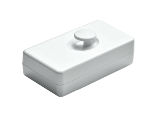 White rectangular device, knob on top, floating on black background