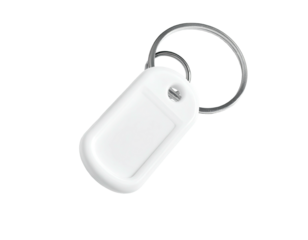 White rectangular key fob attached to a silver keyring on a black background