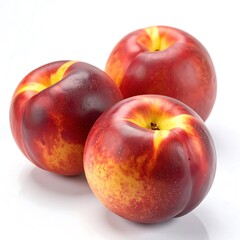 Three ripe nectarines against white background