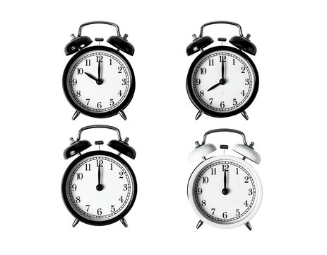Four classic analog clocks displaying different times, arranged on a black background - Powered by Adobe