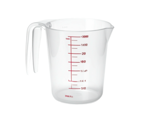 A transparent plastic measuring jug with a handle and red volume markings