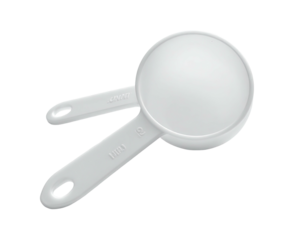 Overhead shot of a white plastic measuring scoop on a black background