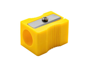 Bright yellow plastic pencil sharpener, blades visible, isolated on black