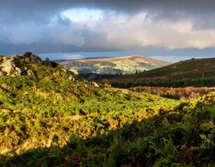 Green hillside under cloudy sky