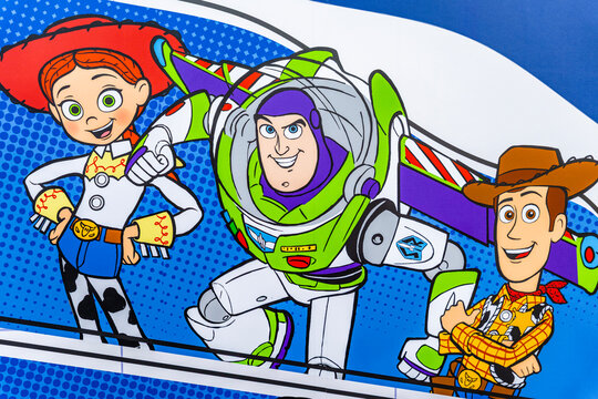 Bangkok, Thailand - September 4, 2025 : Toy Story movie wallpaper backdrop display with Jessie, Buzz Lightyear and Woody, a famous character in movie theatre.