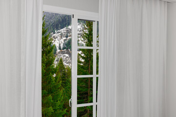 Winter Landscape Seen Through Large Glass Doors