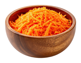 A wooden bowl filled with finely shredded, vibrant orange carrots