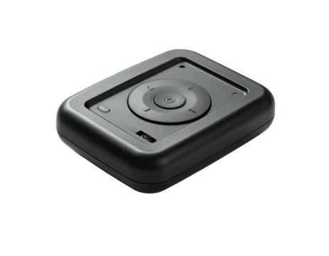 A dark, rectangular device with a central navigation disc on a raised platform