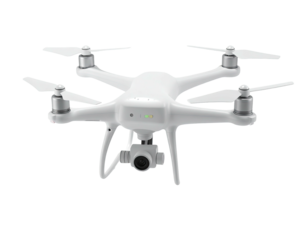 A white quadcopter drone with a gimbal camera, isolated on a black background