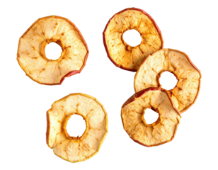 Five dried apple slices, circular with cores, isolated on a black background