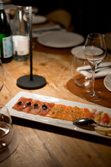 Gourmet Tuna and Salmon Carpaccio at Fine Dining Restaurant
