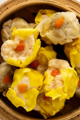 Delicious Dim Sum with Colorful Dumplings in Bamboo Steamer
