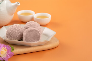 Taro puff pastries with teapot and cups for Mid Autumn Festival