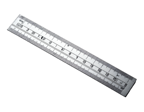 A clear plastic measuring tool with etched markings on a dark background