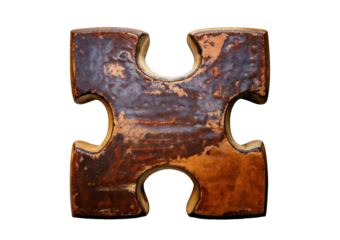 Golden puzzle piece isolated on a transparent or white background.