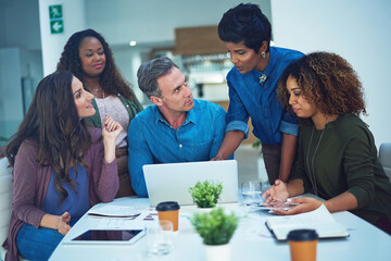 Meeting, listening and people in office with laptop, collaboration or advice for project report. Discussion, teamwork and employees at table with tech, problem solving and idea in department brief.