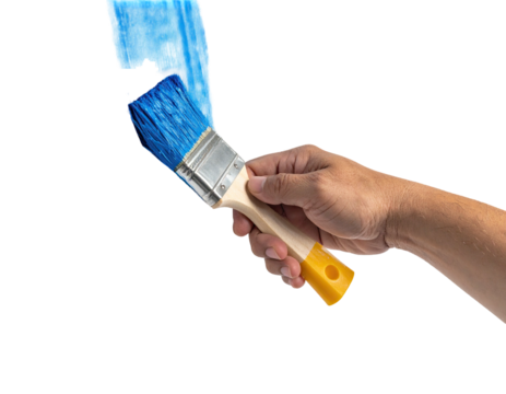 A hand holds a paintbrush, applying vibrant blue paint on a blank surface