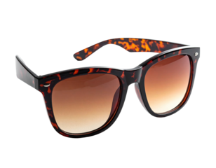 Classic tortoise-shell sunglasses with brown gradient lenses, isolated on black