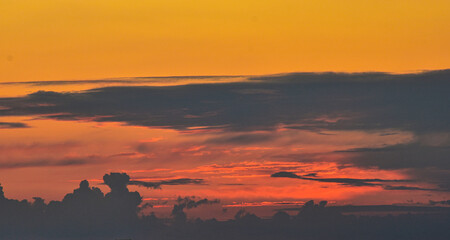 Soft clouds glowing at sunset in magical dreamy sky