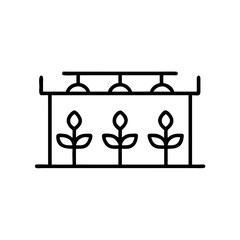 Hydroponic farm setup with plants growing under artificial lights  