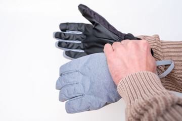 Pair specialized ski gloves for winter sports, insulated, protective, Winter-ready gloves, suitable skiing, snowboarding, cold weather activities, Cold-weather fashion, Practical winter accessory