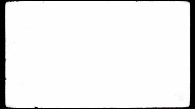 Vintage 8mm or 16mm film frame border with rounded corners, dust, and scratches. Seamless loop on a white background for use as a luma matte or overlay to create a retro cinematic look
