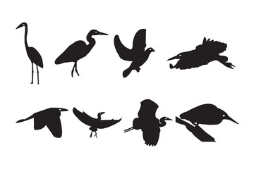 Silhouette vector set of various birds including herons, cranes, and kingfishers in different flying and perching positions. Ideal for nature, wildlife, and decorative design projects.