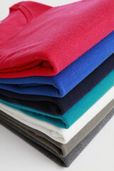 Stack of colorful folded sweaters