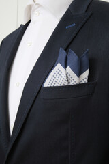 Elegant navy suit with a patterned pocket square