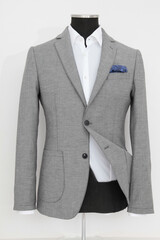 Elegant gray blazer on a mannequin