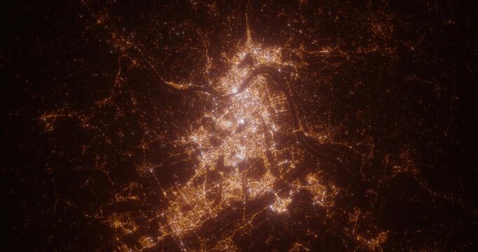 Linz (Austria) aerial view at night. Top view on city from space. Camera is zooming in, rotating clockwise