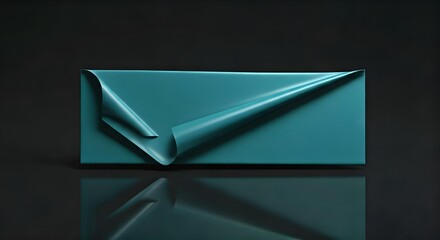 Close-up of a teal-colored envelope with a folded flap on a reflective surface against a dark background with dramatic lighting.