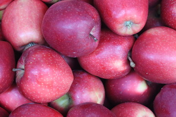 Ripe red apples creating a vibrant healthy background