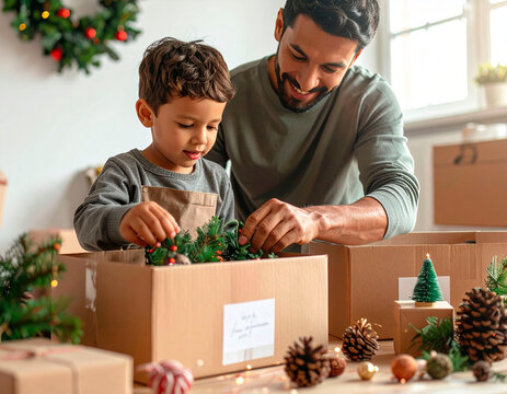 Father and son unpacking christmas decorations celebrating holiday