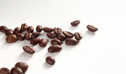 roasted coffee beans isolated on a white background, side-view, sharp