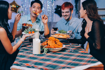 Diversity, dinner and group of people toast celebration together at party. Friends, happy and celebrate with food, wine and friendship for love, support and cheers champagne at business function